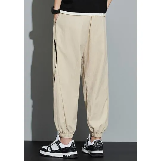 Tapered Zippered Pocket Solid Color Cargo Pants