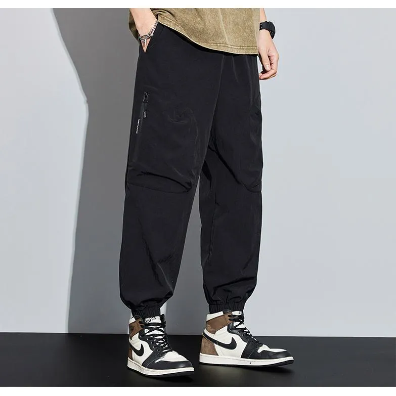 Tapered Zippered Pocket Solid Color Cargo Pants