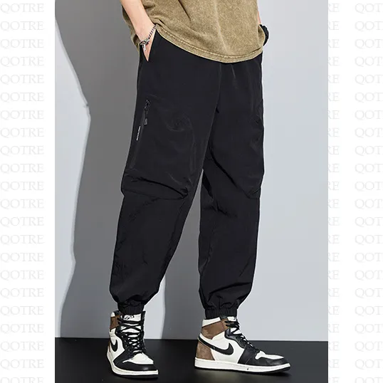 Tapered Zippered Pocket Solid Color Cargo Pants