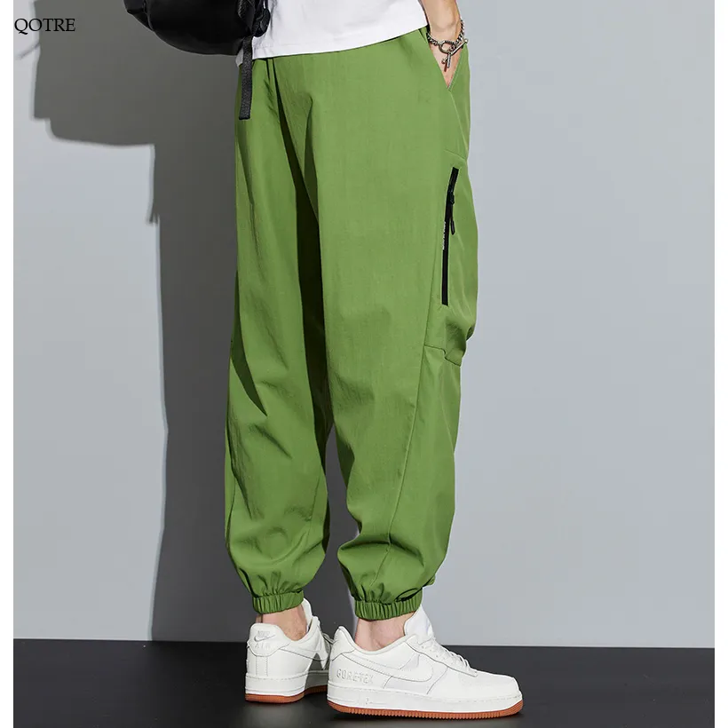 Tapered Zippered Pocket Solid Color Cargo Pants